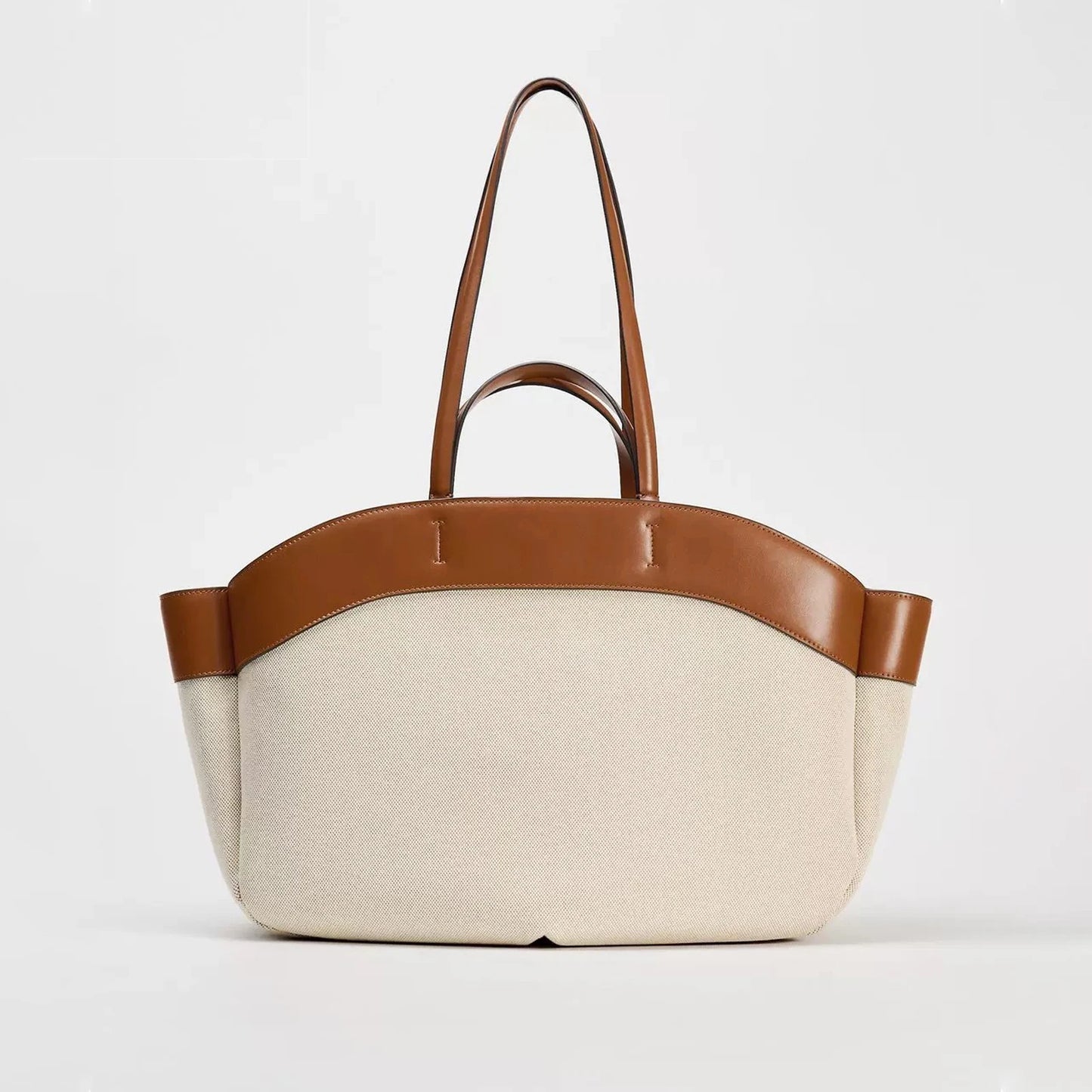 Canvas bag for women 2024 new product, fashionable splicing, large capacity commuting shopping bag, hand-held single shoulder to