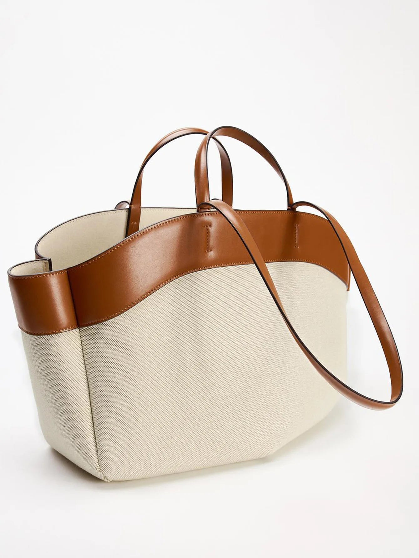 Canvas bag for women 2024 new product, fashionable splicing, large capacity commuting shopping bag, hand-held single shoulder to